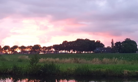 Zonsondergang vanaf ons terras